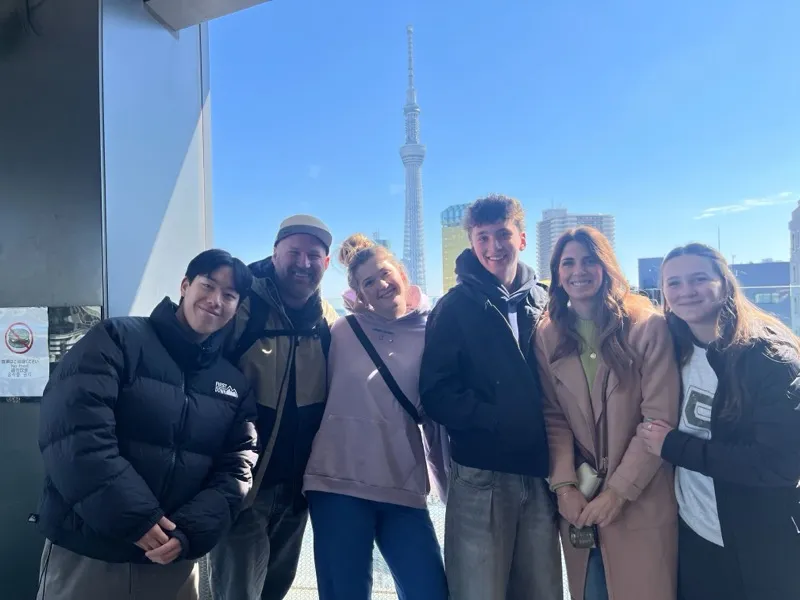Tour group with Tokyo Skytree in the background
